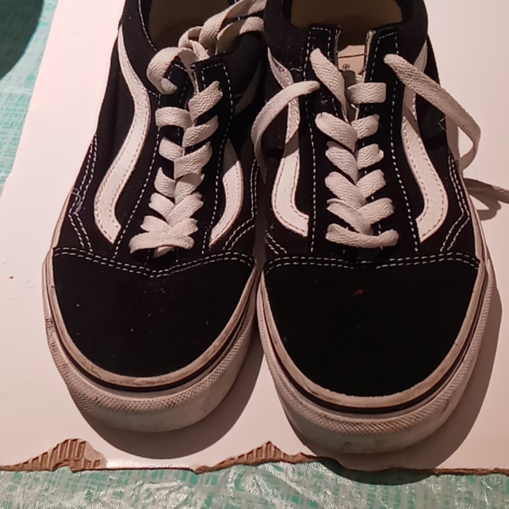 Used black and white casual shoes